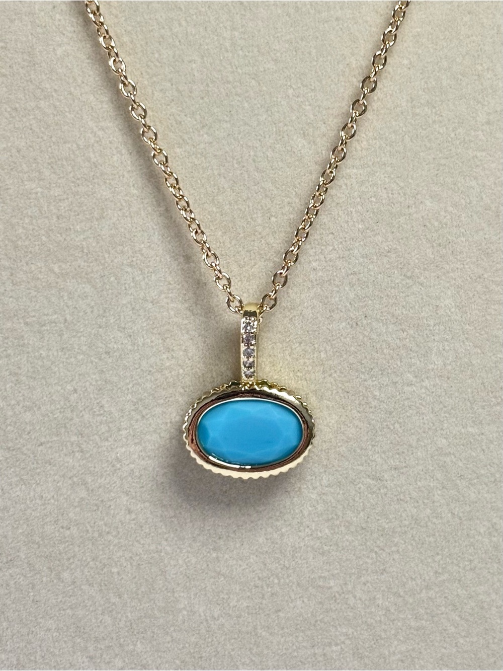 Gold east-west turquoise pendant